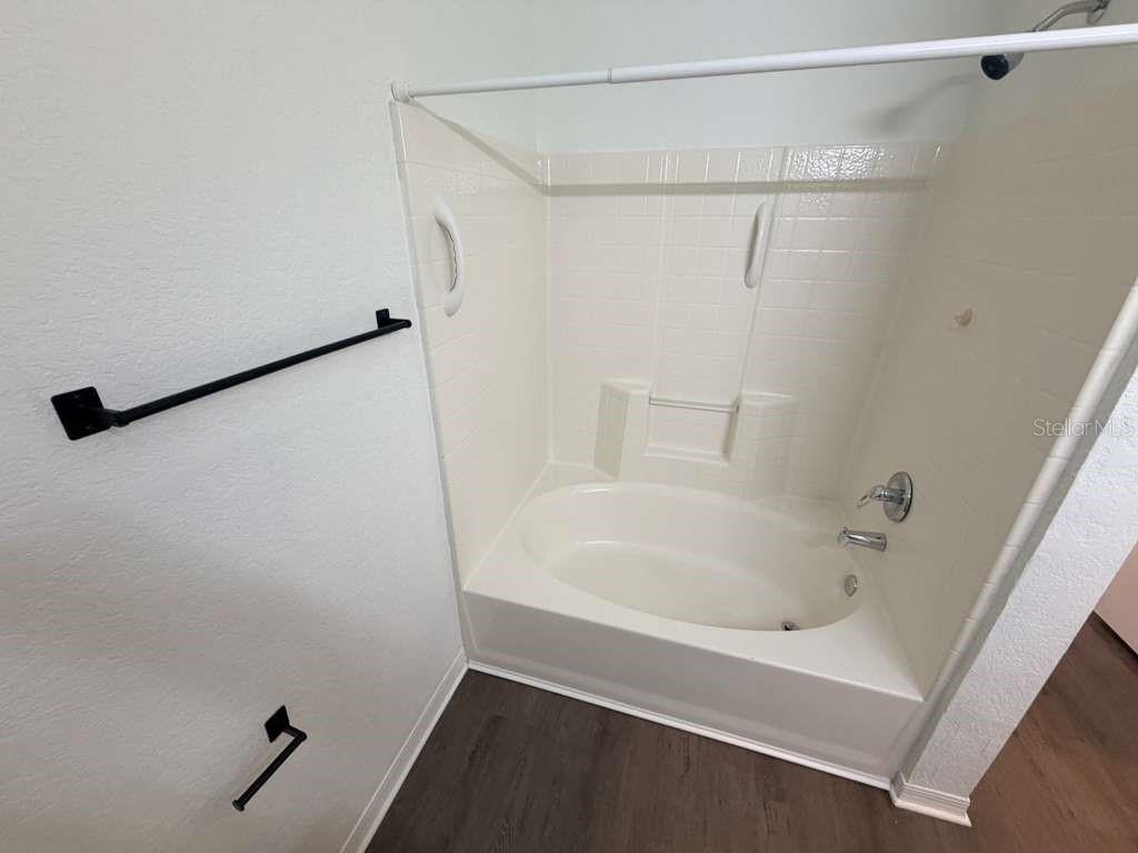 825 Grand Regency Point, Unit 102 Altamonte Springs, FL 32714 - Photo 15 of 29 a bathroom with a bathtub