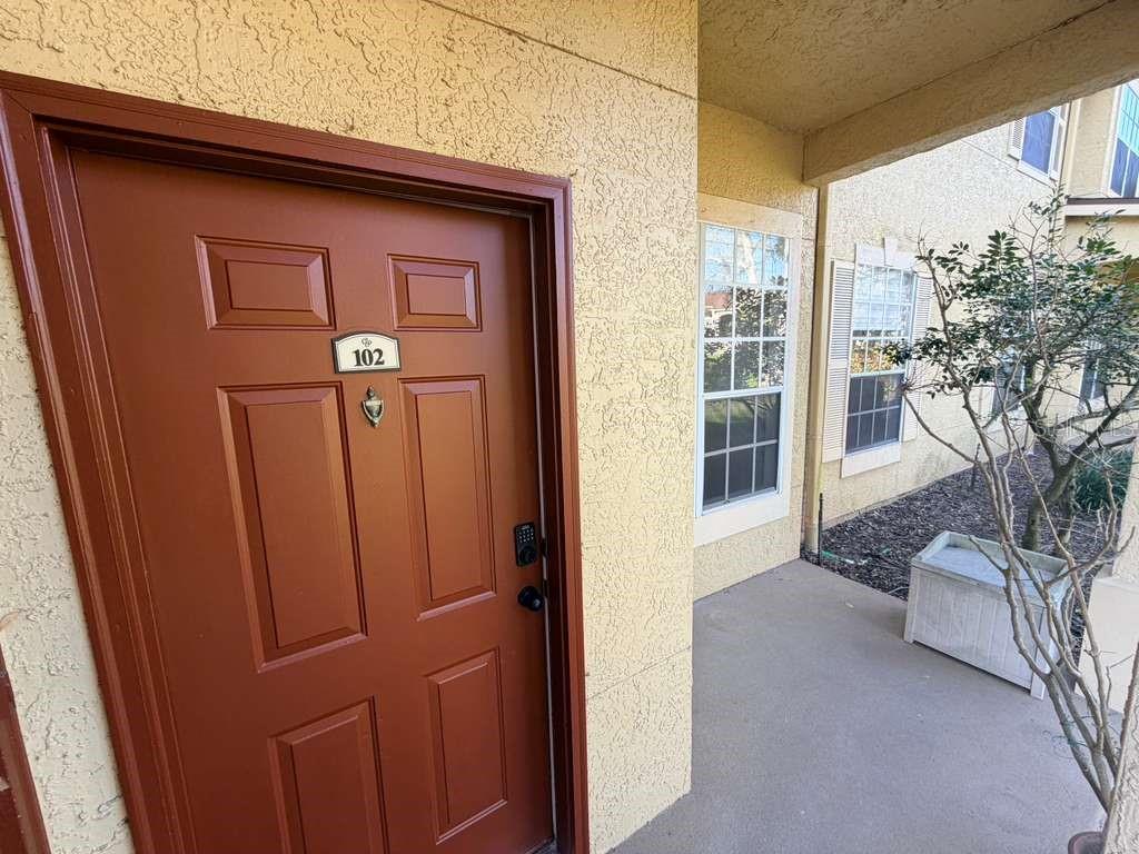 825 Grand Regency Point, Unit 102 Altamonte Springs, FL 32714 - Photo 26 of 29 a view of a house with a glass door