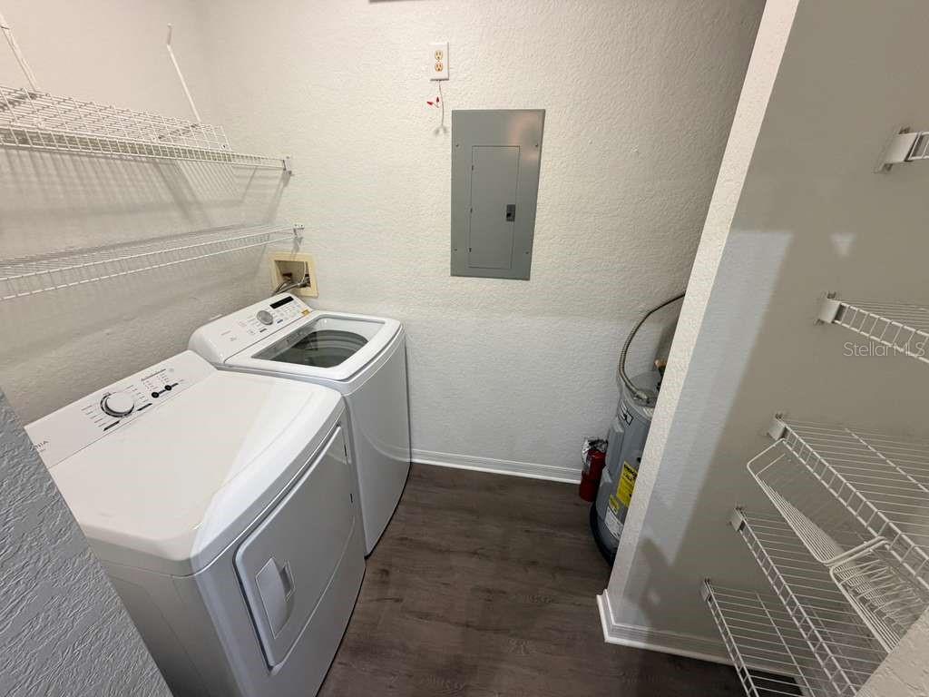 825 Grand Regency Point, Unit 102 Altamonte Springs, FL 32714 - Photo 9 of 29 a utility room with dryer and washer
