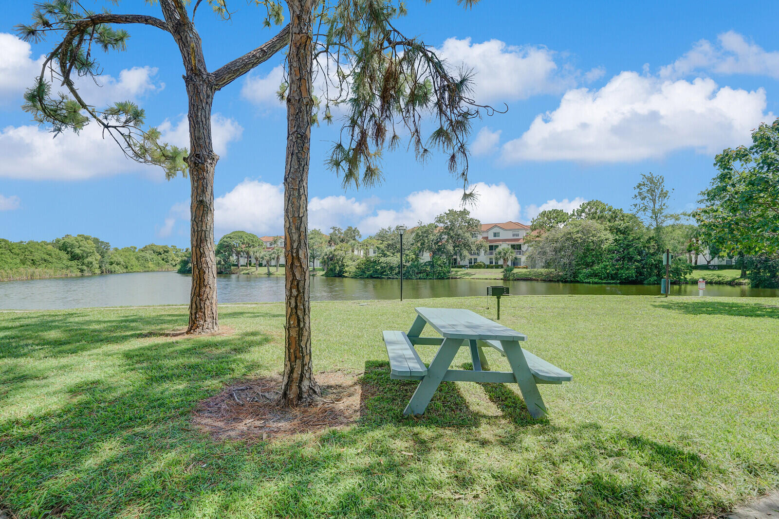 1385 Crystal Way, Unit M Delray Beach, FL 33444 - Photo 22 of 29 Lake Seating Area