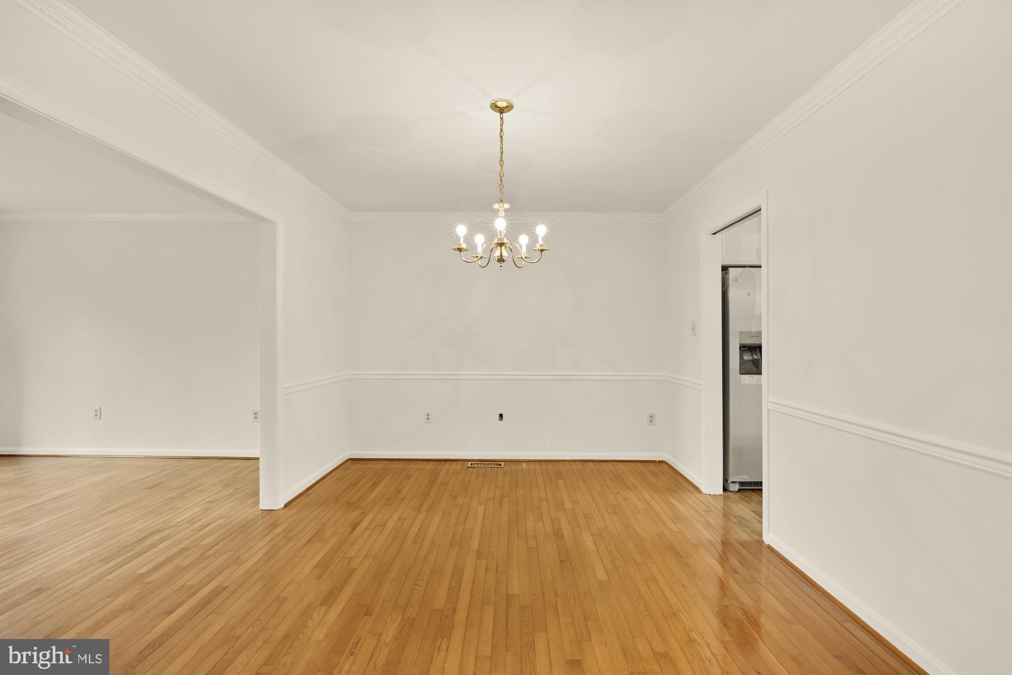 2 Spindrift Way Annapolis, MD 21403 - Photo 12 of 39 wooden floor in an empty room with a window
