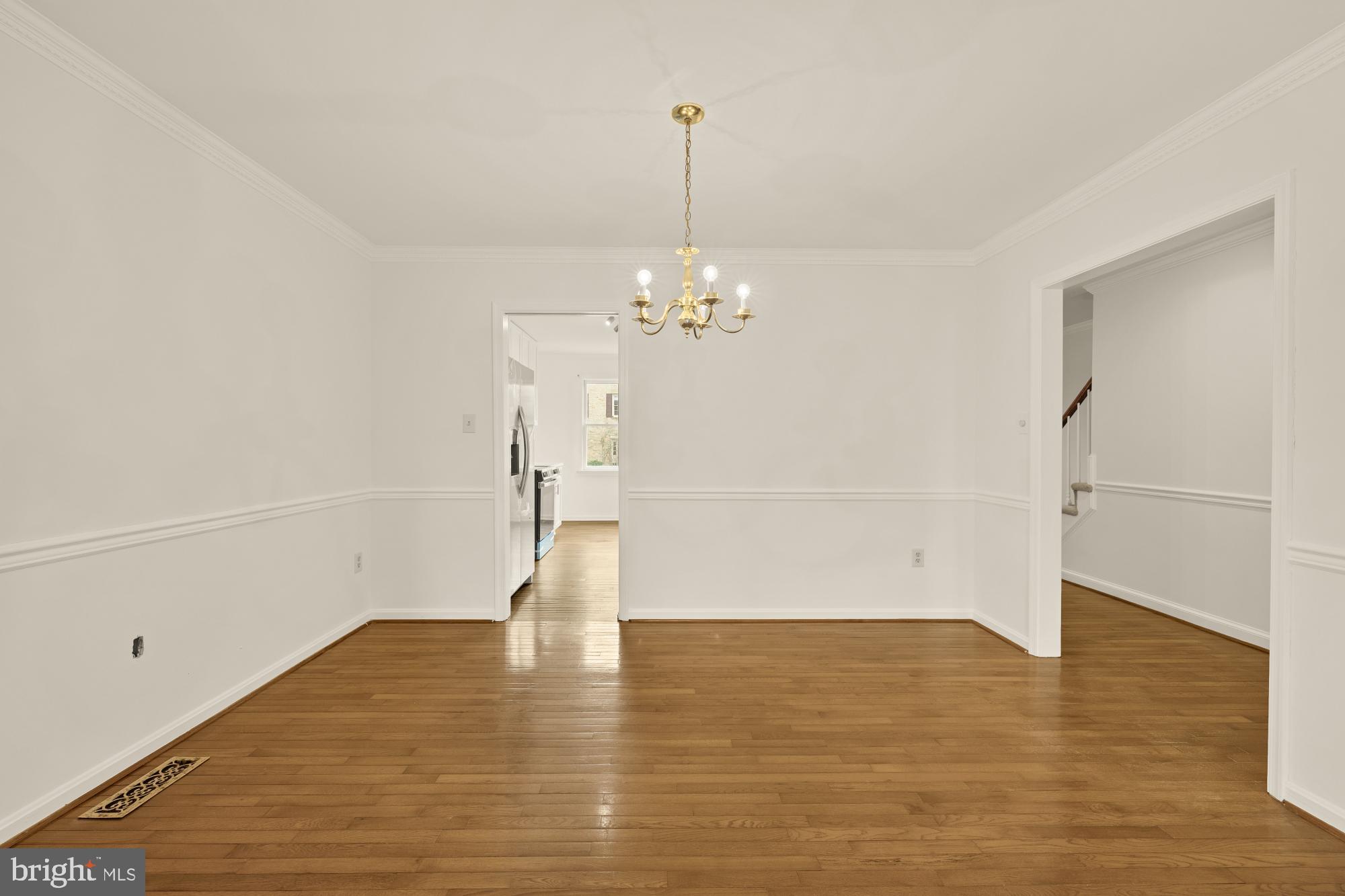 2 Spindrift Way Annapolis, MD 21403 - Photo 13 of 39 a view of a room with wooden floor and staircase