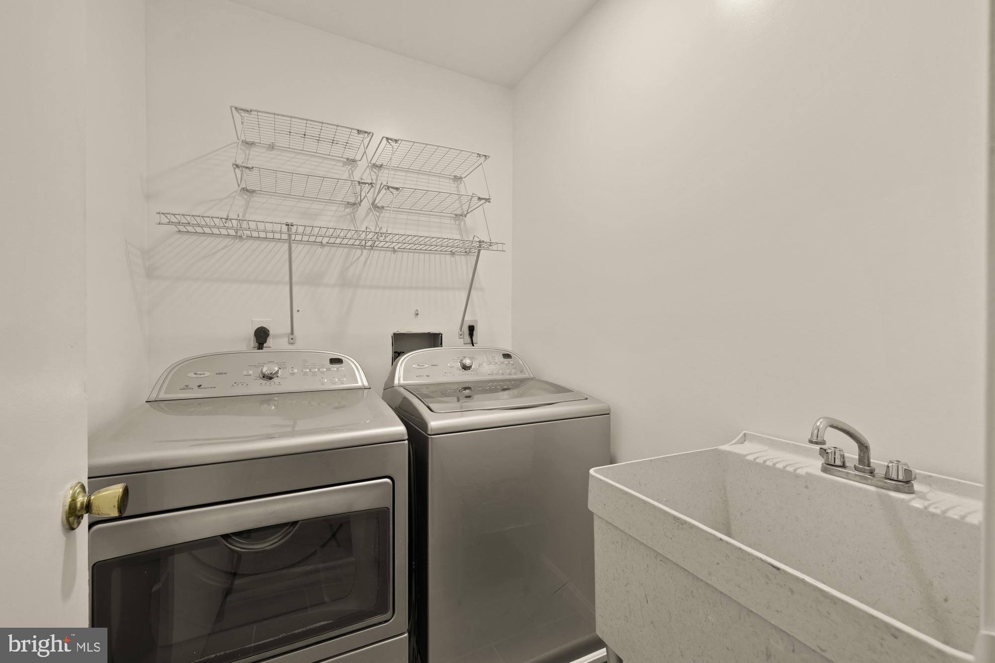 2 Spindrift Way Annapolis, MD 21403 - Photo 18 of 39 a utility room with dryer and washer