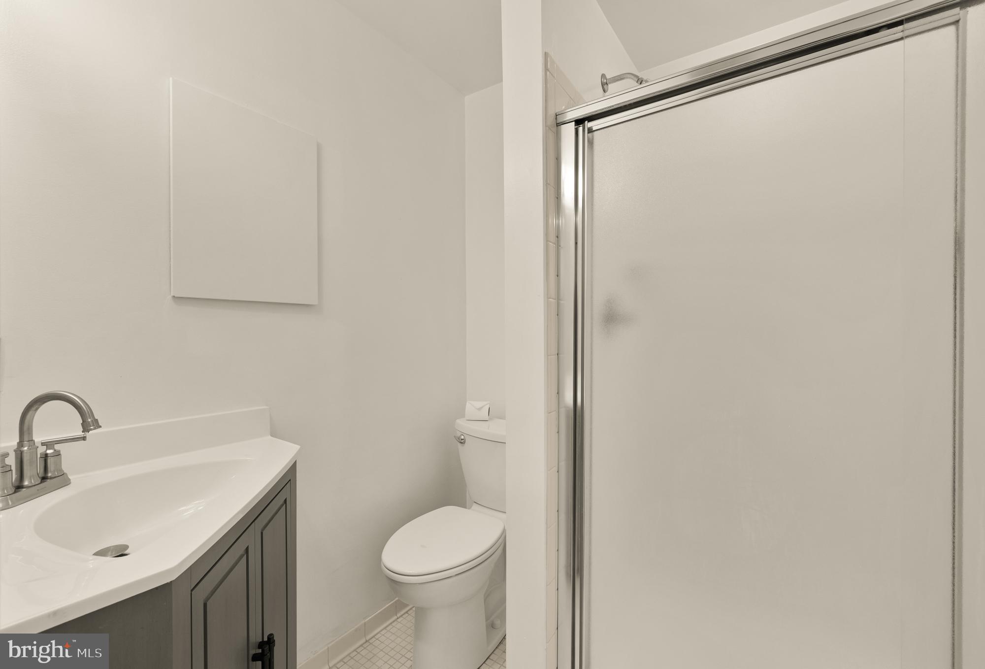 2 Spindrift Way Annapolis, MD 21403 - Photo 33 of 39 a bathroom with a sink and a toilet