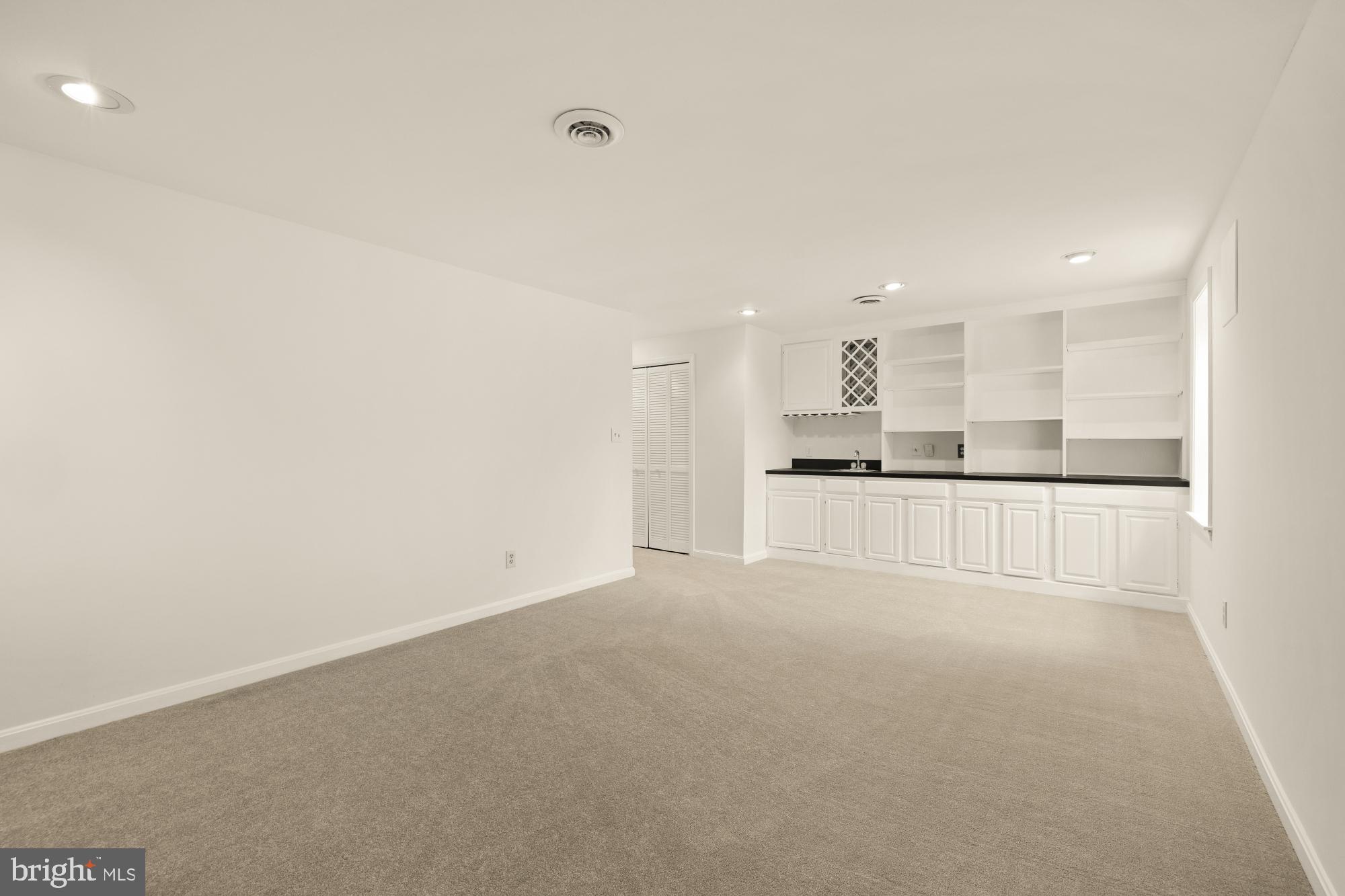 2 Spindrift Way Annapolis, MD 21403 - Photo 36 of 39 a view of kitchen with refrigerator and white cabinets