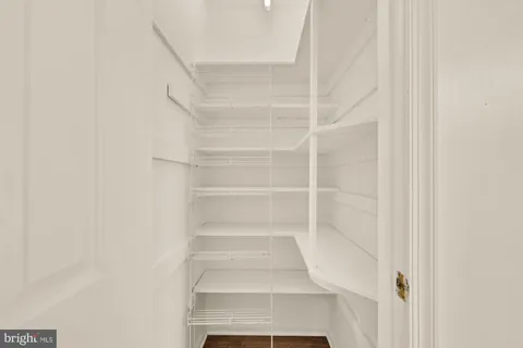 a view of staircase with white walls