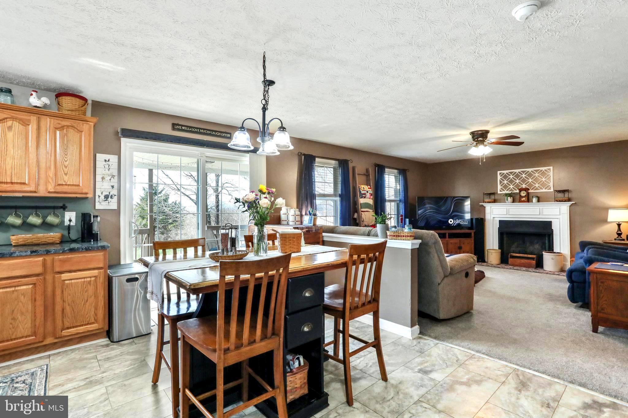 1147 Happy Ridge Drive Front Royal, VA 22630 - Photo 11 of 42 a view of a dining room with furniture window and outside view