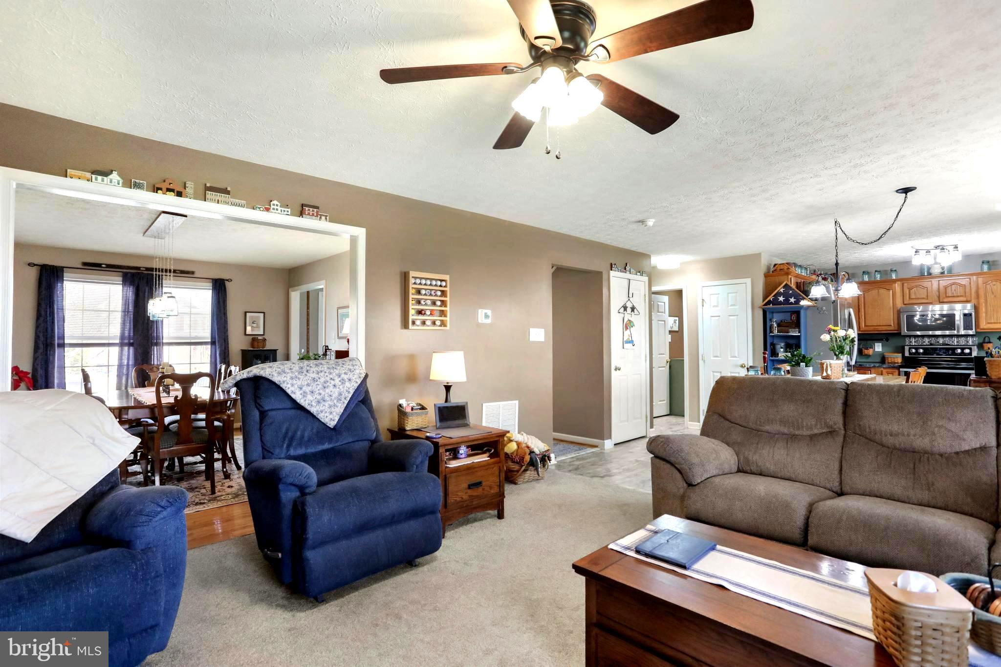 1147 Happy Ridge Drive Front Royal, VA 22630 - Photo 13 of 42 a living room with furniture and a large window