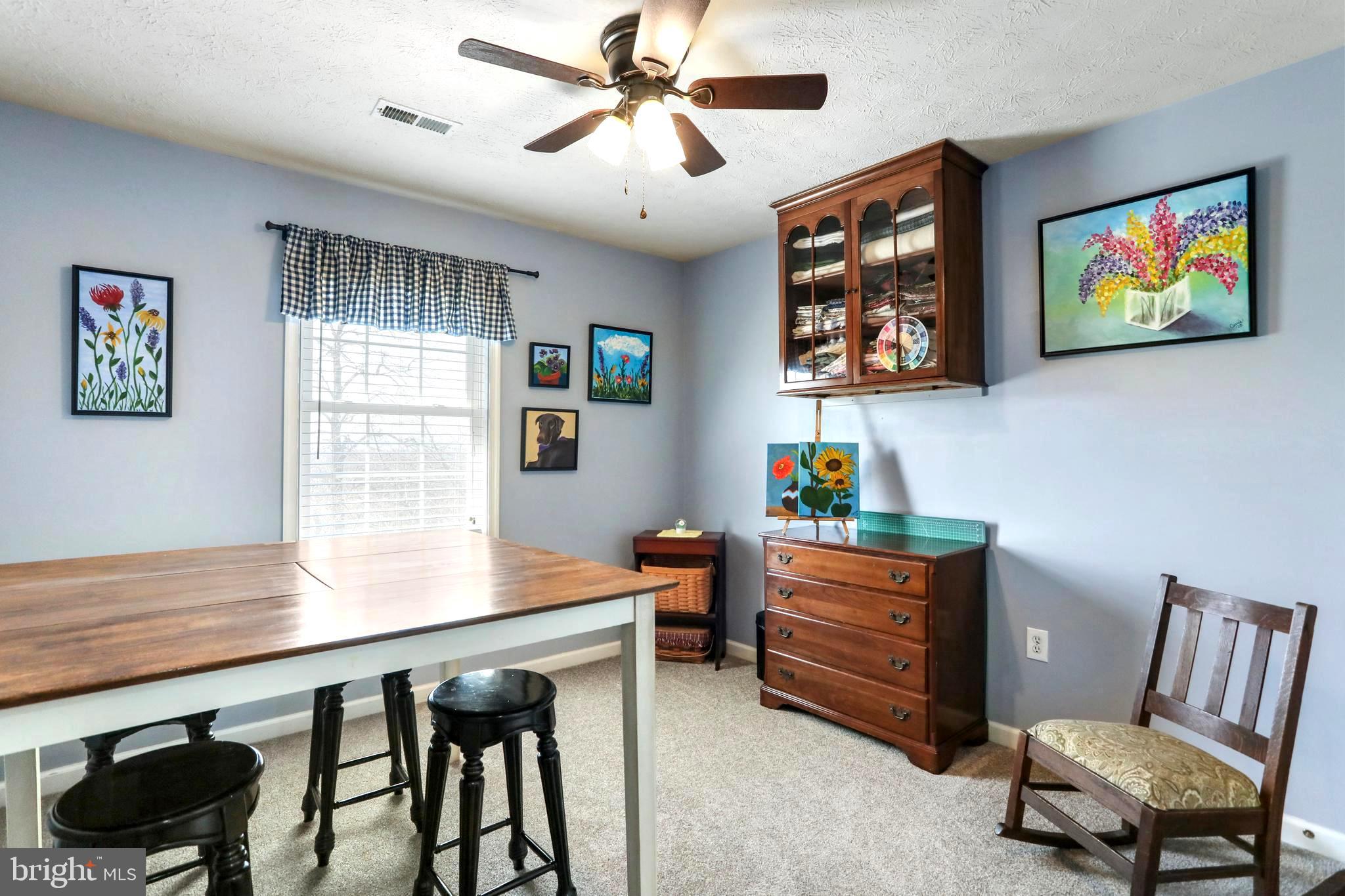 1147 Happy Ridge Drive Front Royal, VA 22630 - Photo 22 of 42 a room with furniture and a window