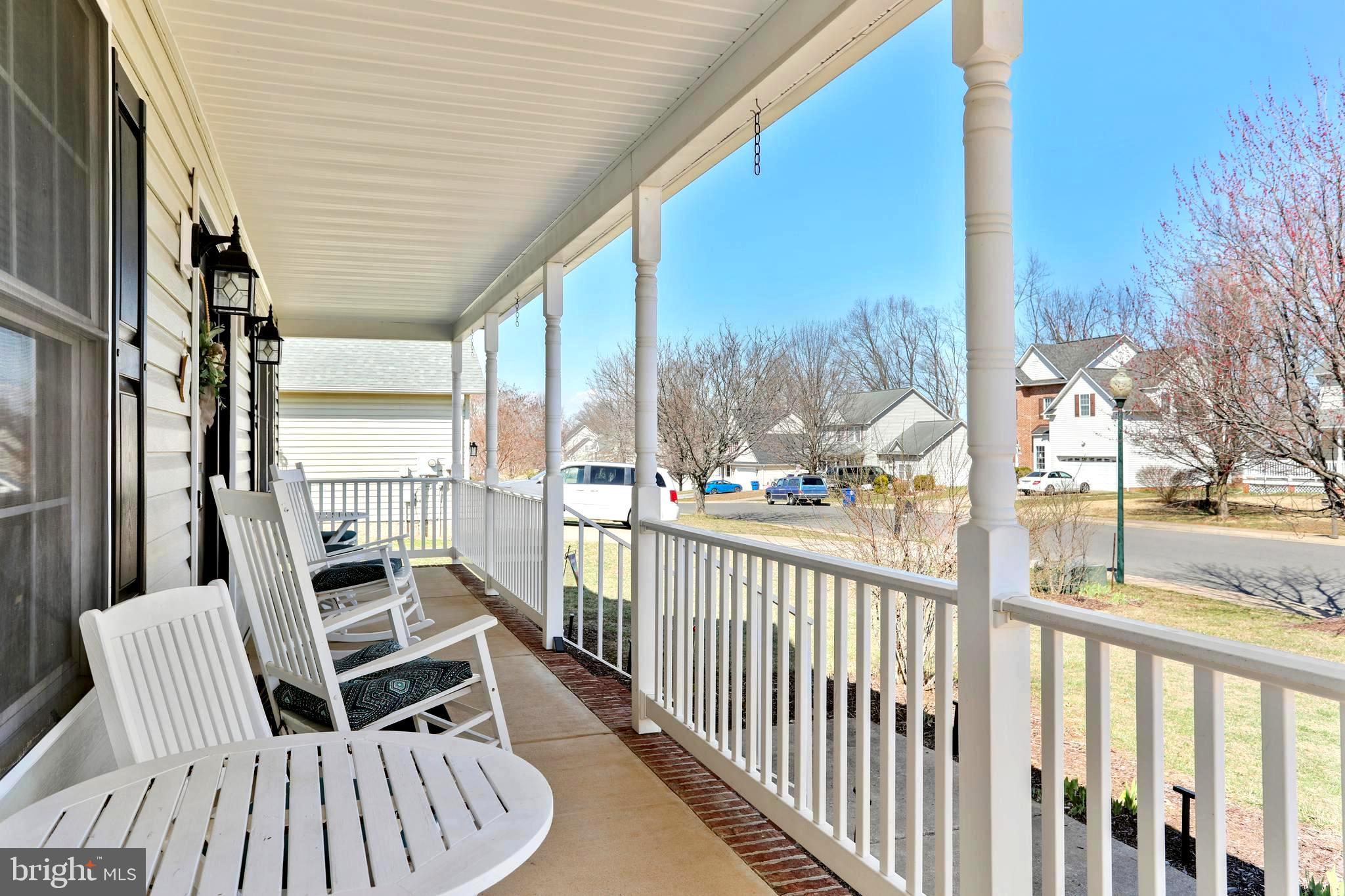 1147 Happy Ridge Drive Front Royal, VA 22630 - Photo 32 of 42 a view of a chair and tables in the balcony