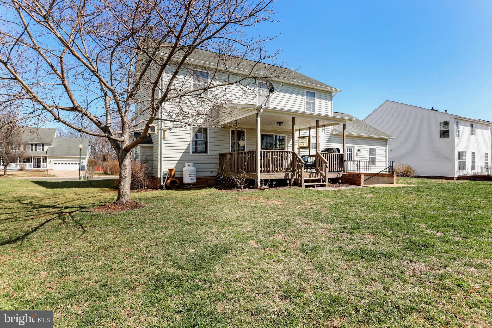 1147 Happy Ridge Drive Front Royal, VA 22630 - Photo 35 of 42 a view of a house with a yard