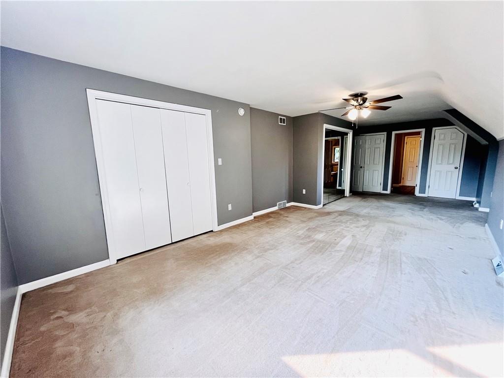 475 Bradys Ridge Road Beaver, PA 15009 - Photo 17 of 38 a view of a livingroom with a ceiling fan