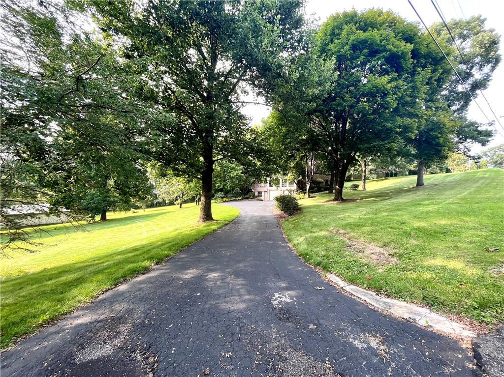 475 Bradys Ridge Road Beaver, PA 15009 - Photo 2 of 38 a view of a yard with swimming pool