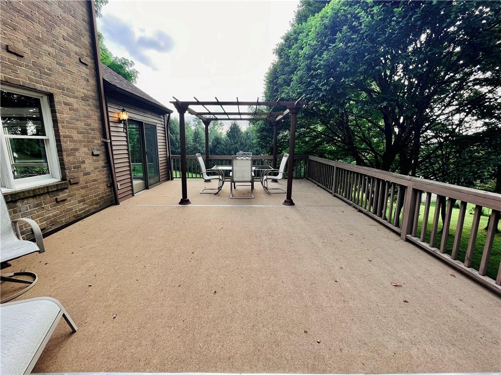 475 Bradys Ridge Road Beaver, PA 15009 - Photo 31 of 38 a view of backyard with a table and chairs with wooden fence