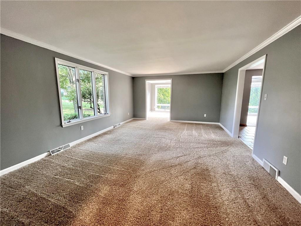 475 Bradys Ridge Road Beaver, PA 15009 - Photo 6 of 38 a view of an empty room with a window