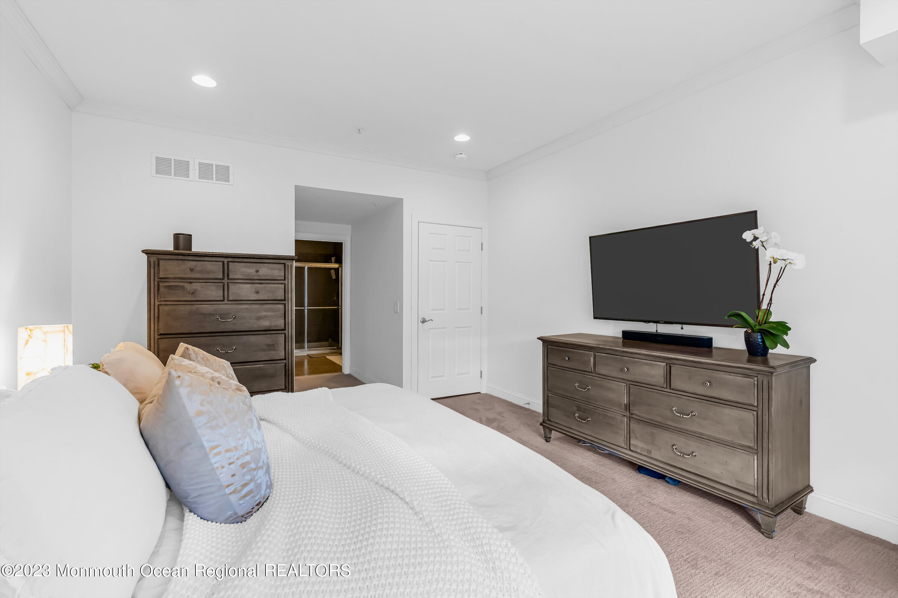 310 April Way Middletown, NJ 07748 - Photo 16 of 31 a bedroom with a bed and flat screen tv