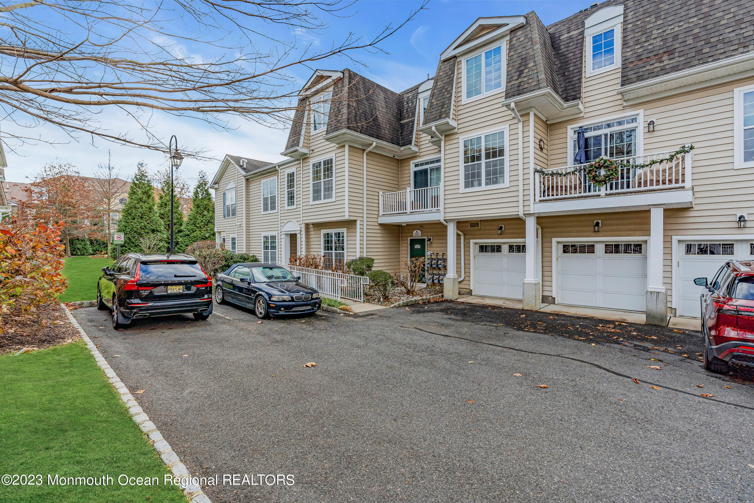 310 April Way Middletown, NJ 07748 - Photo 2 of 31 a view of a car park in front of house