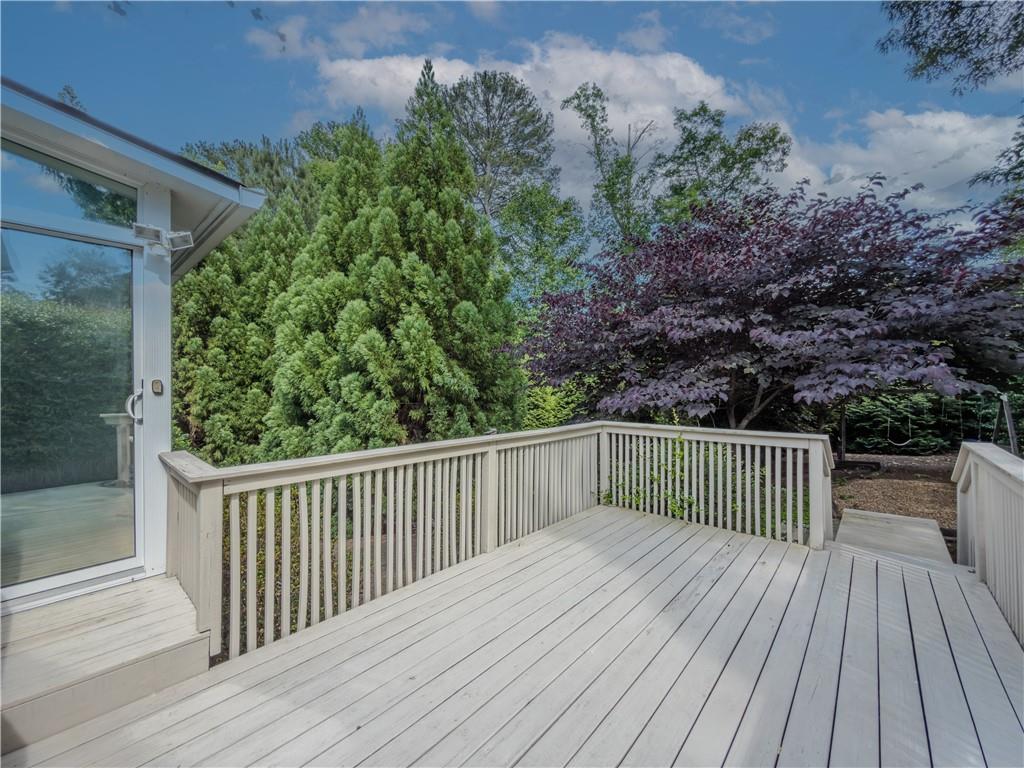 4284 Cedar Bluff Way Southwest Lilburn, GA 30047 - Photo 59 of 62 a view of backyard with deck