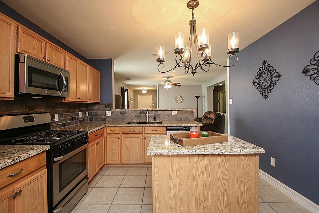 3603 Garrison Run Drive Spring, TX 77386 - Photo 10 of 26 Beautiful kitchen with stainless appliances, granite counters & a gas stove