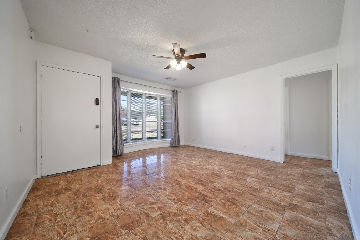 990 Redway Lane Houston, TX 77062 - Photo 6 of 21 a view of an empty room with a window