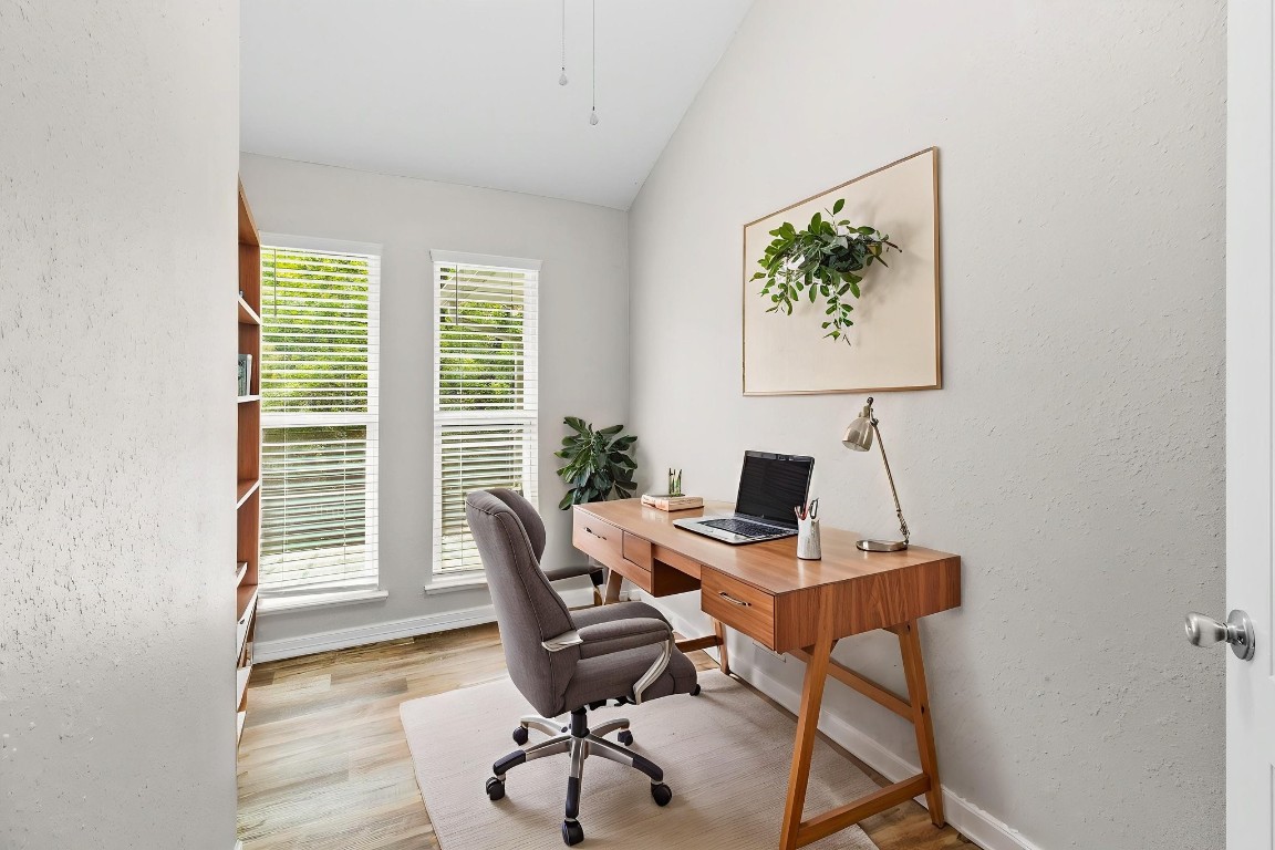 21 Red Oak Circle Point Blank, TX 77364 - Photo 16 of 50 a view of a workspace with furniture and a window