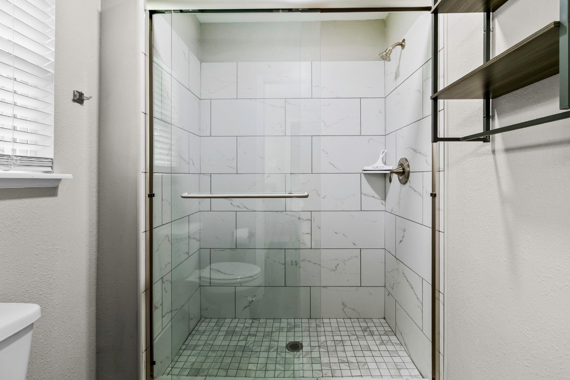 21 Red Oak Circle Point Blank, TX 77364 - Photo 17 of 50 a bathroom with a shower