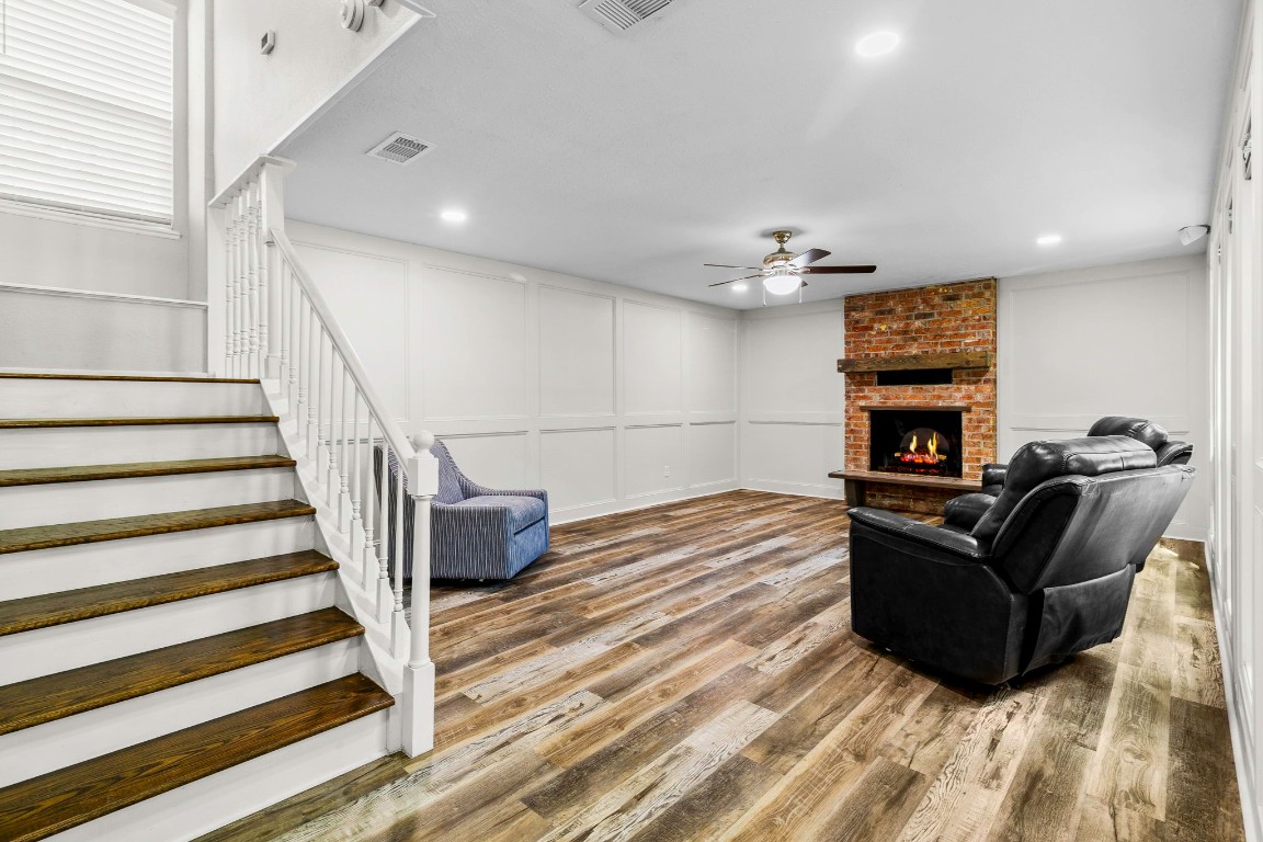 21 Red Oak Circle Point Blank, TX 77364 - Photo 2 of 50 a living room with furniture and a fireplace