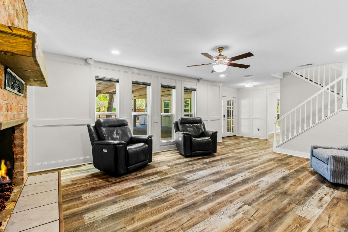 21 Red Oak Circle Point Blank, TX 77364 - Photo 3 of 50 a living room with furniture ceiling fan and a rug