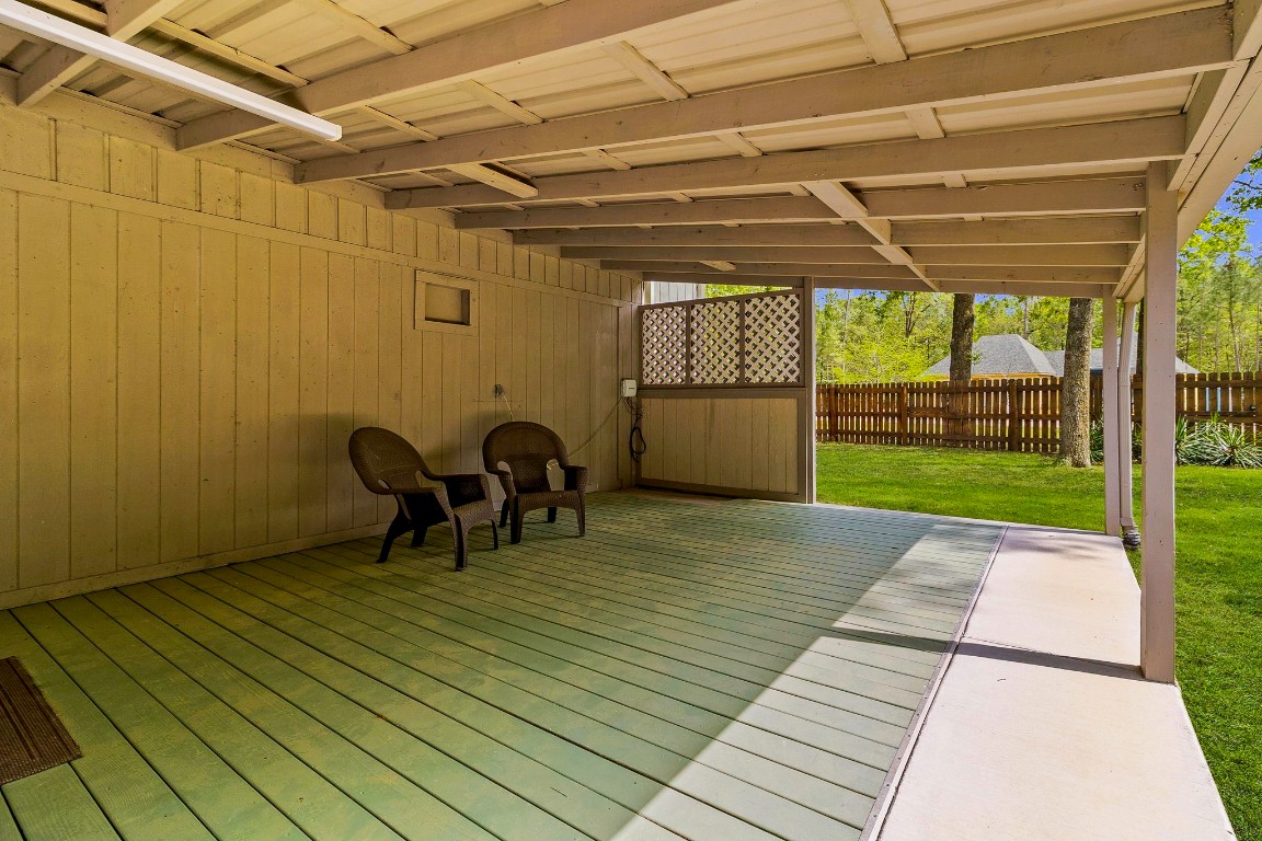 21 Red Oak Circle Point Blank, TX 77364 - Photo 31 of 50 a view of a patio with table and chairs