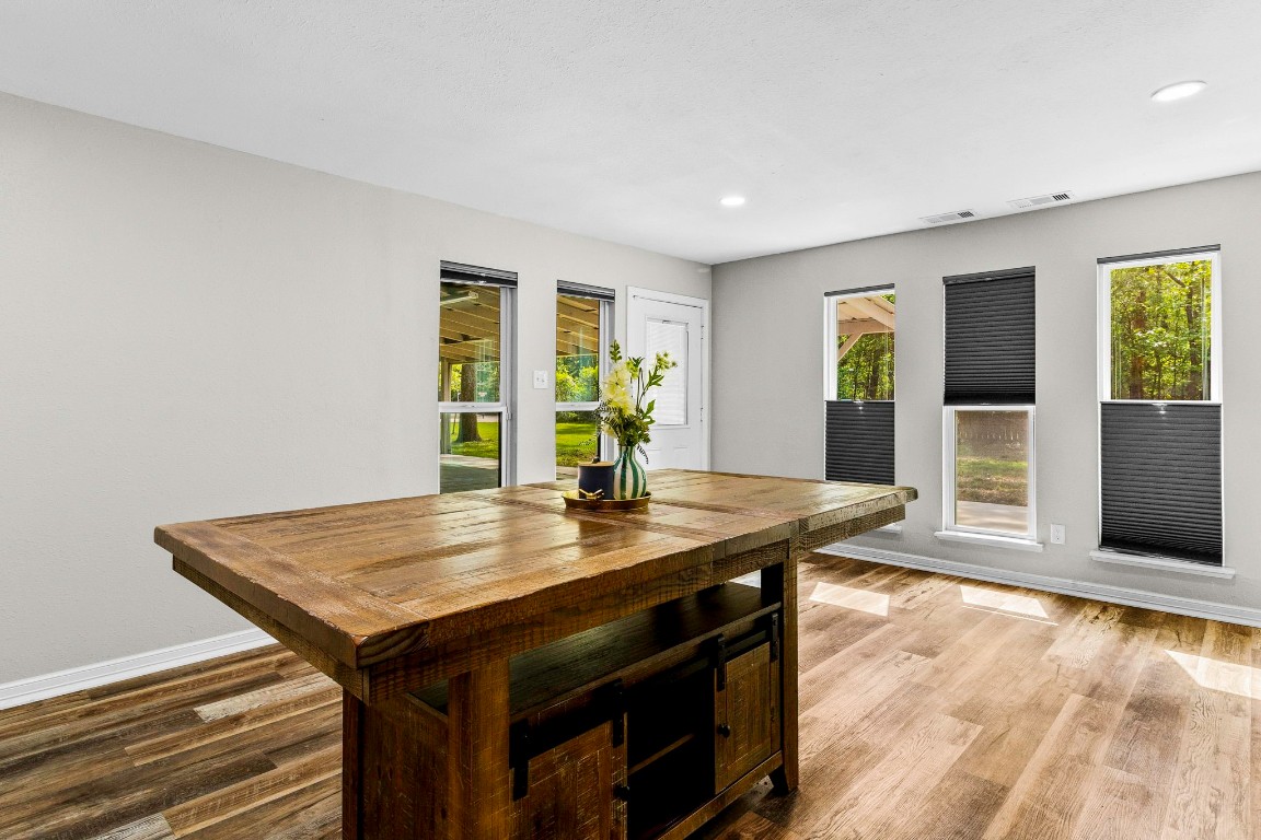 21 Red Oak Circle Point Blank, TX 77364 - Photo 5 of 50 a view of a dining room with furniture and window