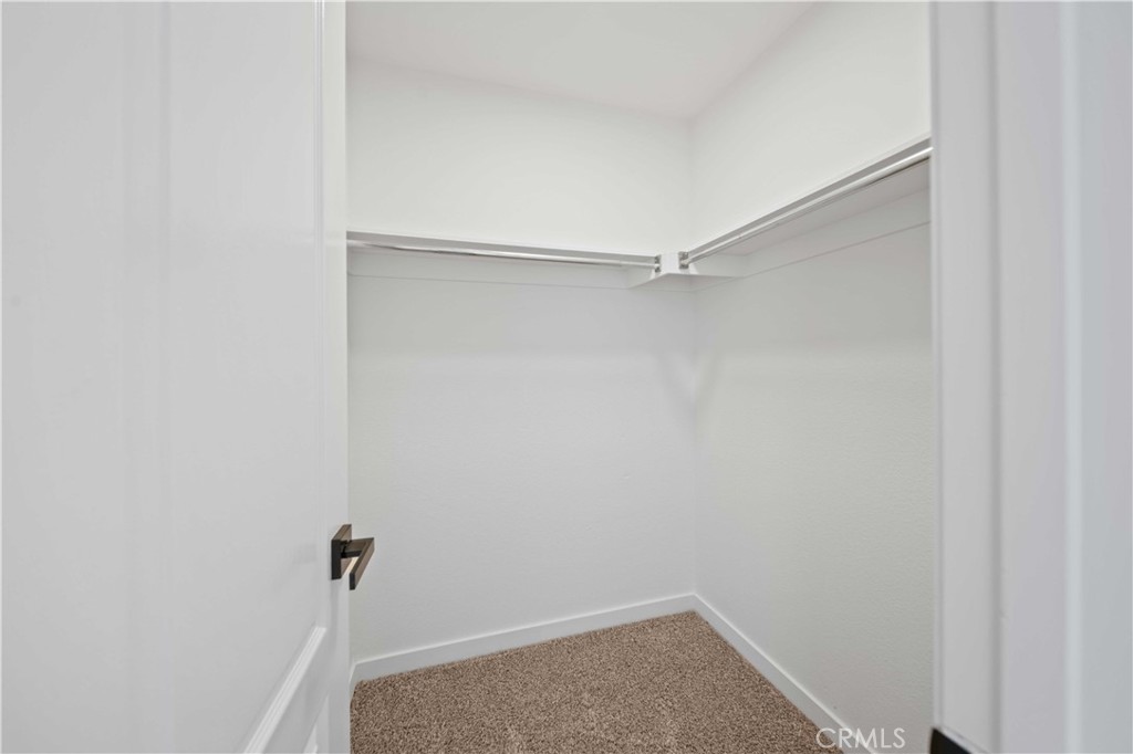 22 Oak Tree Drive Rancho Mirage, CA 92270 - Photo 18 of 25 a view of a room with shelf