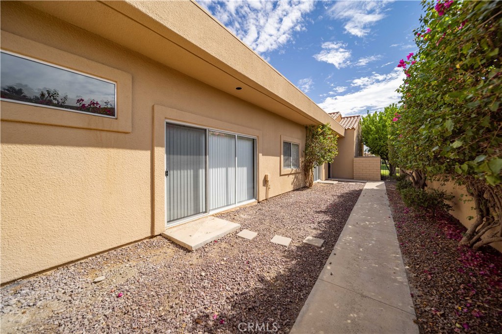 22 Oak Tree Drive Rancho Mirage, CA 92270 - Photo 20 of 25 a view of backyard of house