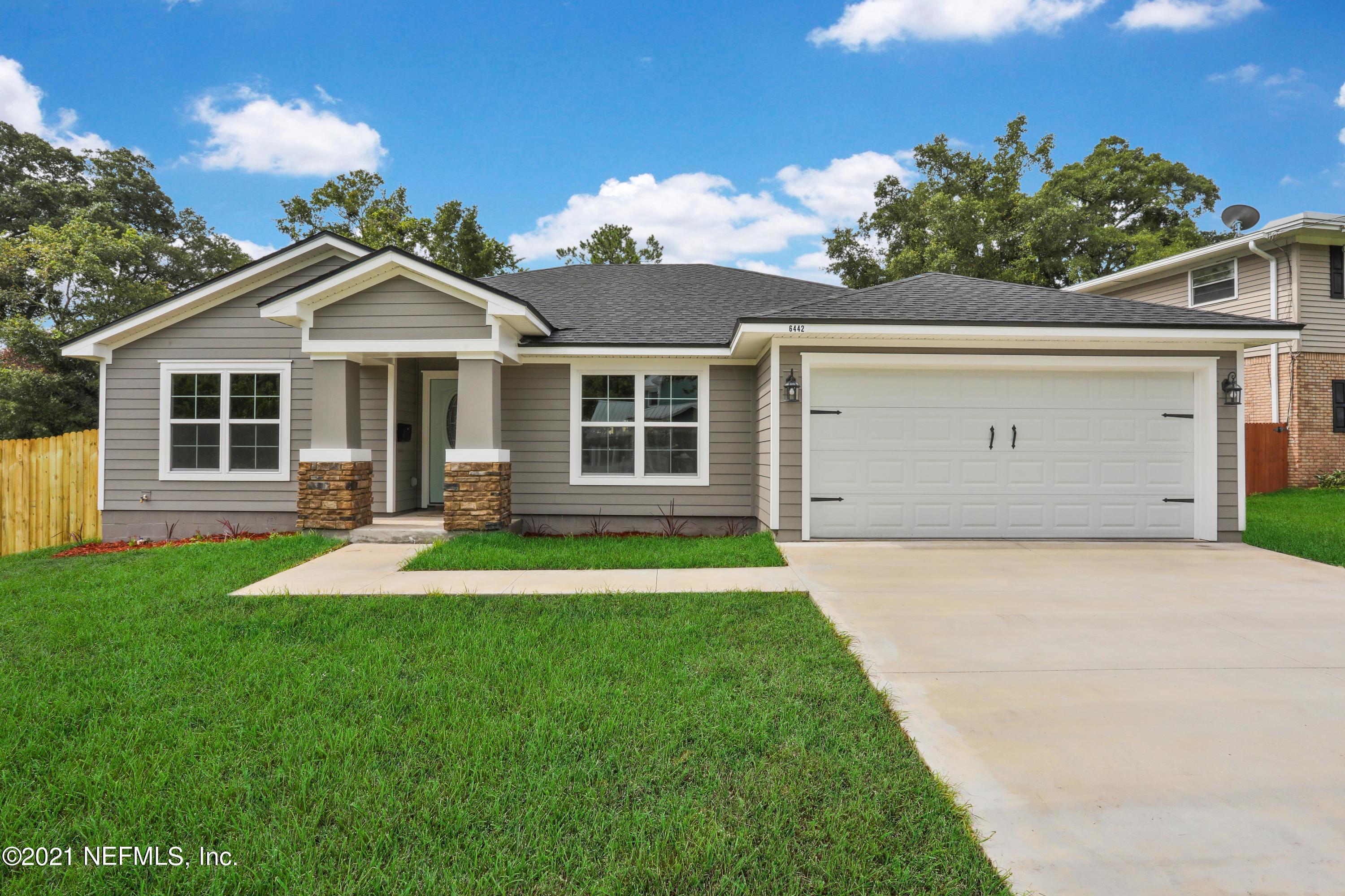 6442 Heidi Road Jacksonville, FL 32277 - Photo 1 of 30 front view of a house with a yard
