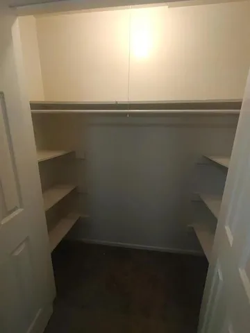 a view of small space with racks on the wall