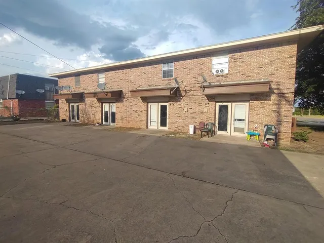 a view of a building with a street