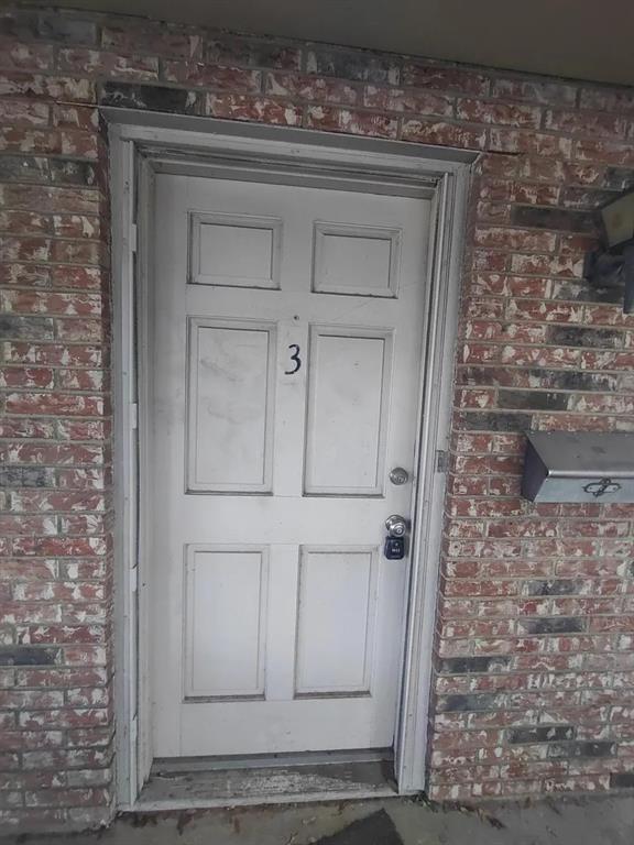 7816 Romney Road, Unit 3 Fort Worth, TX 76134 - Photo 2 of 18 a view of front door