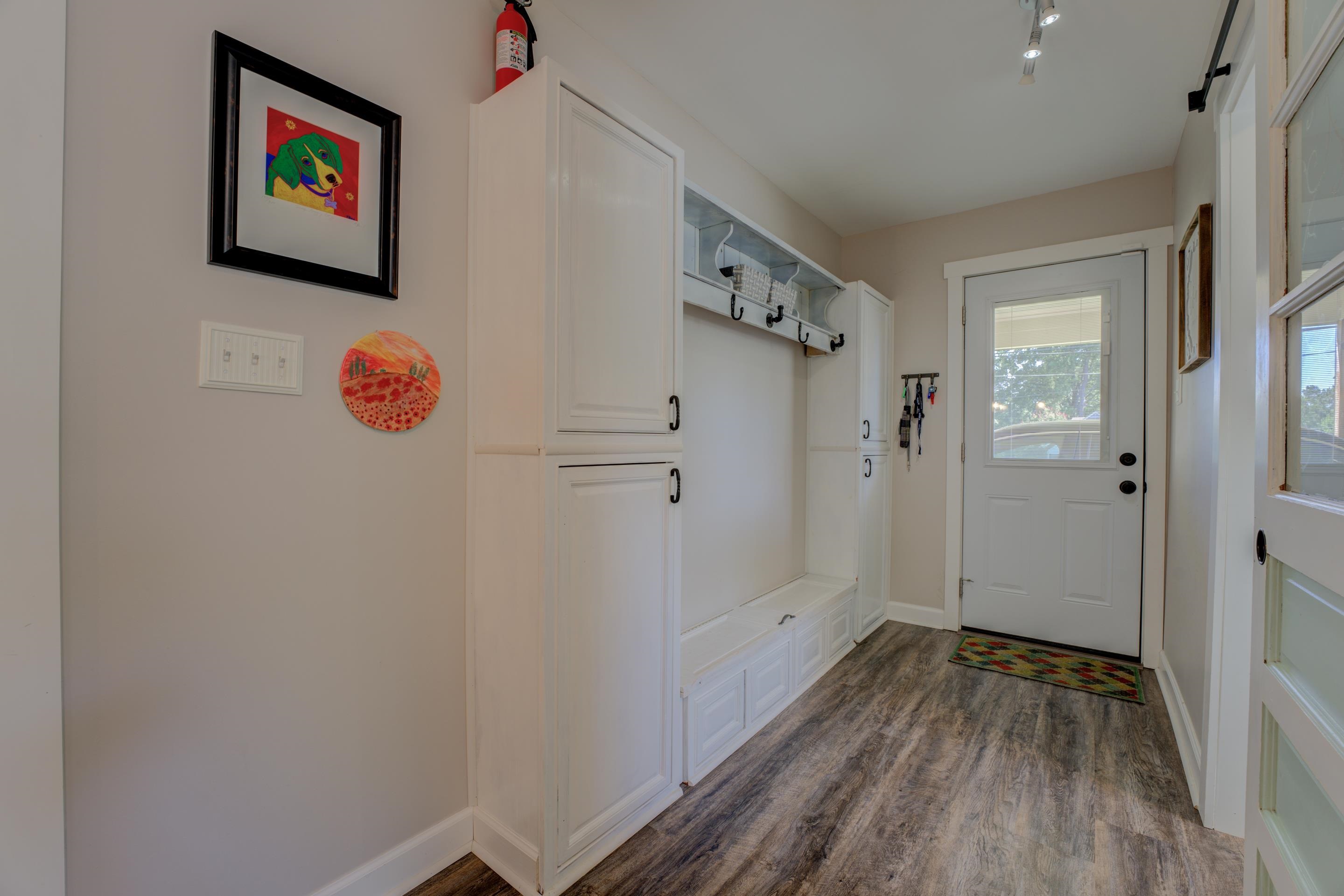 1501 Hayne Road Memphis, TN 38119 - Photo 8 of 33 a view of a hallway with wooden floor and closet