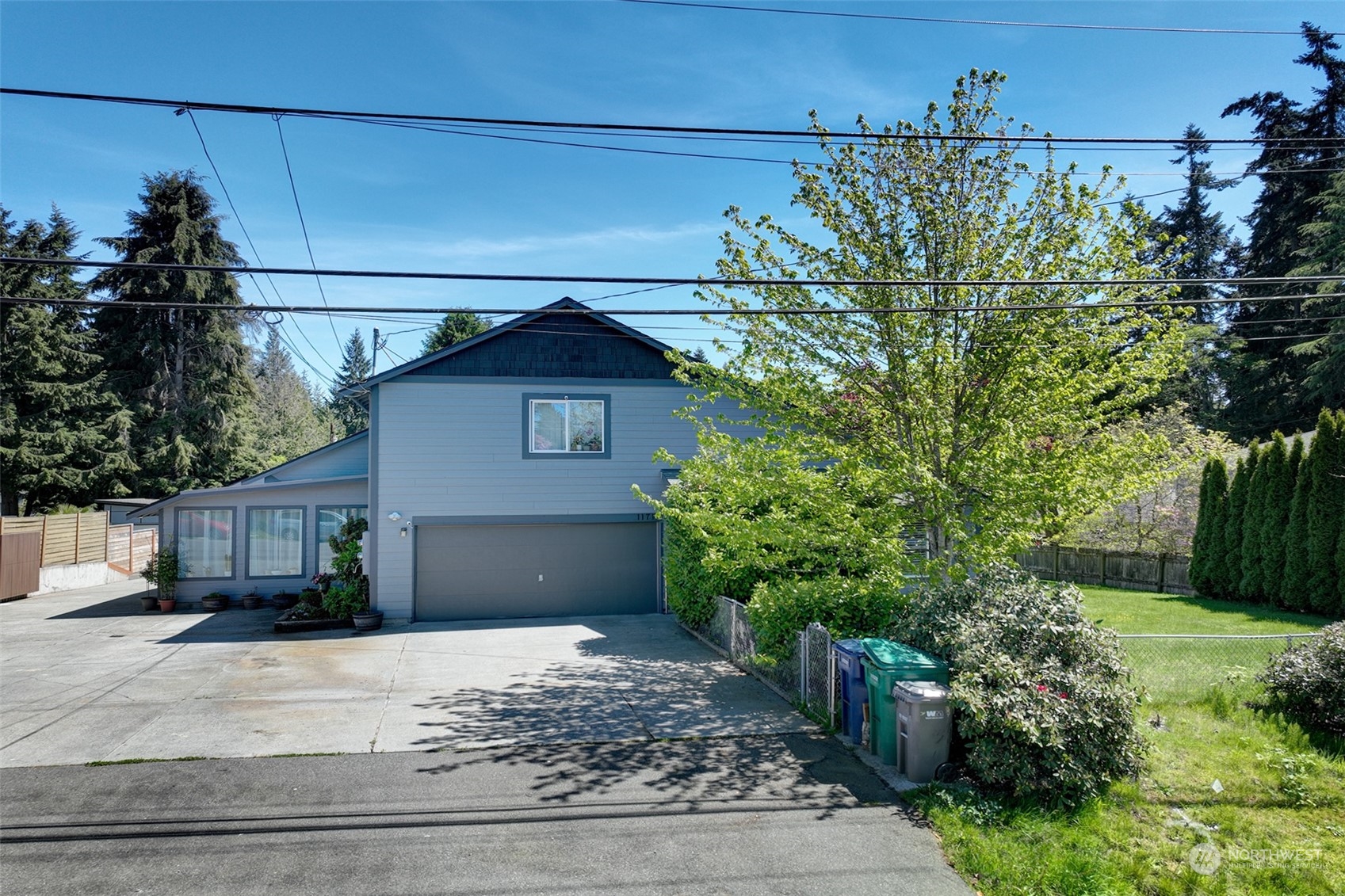 11717 2nd Drive Southeast, Unit A & B Everett, WA 98208 - Photo 3 of 40 a view of a house with a yard and potted plants