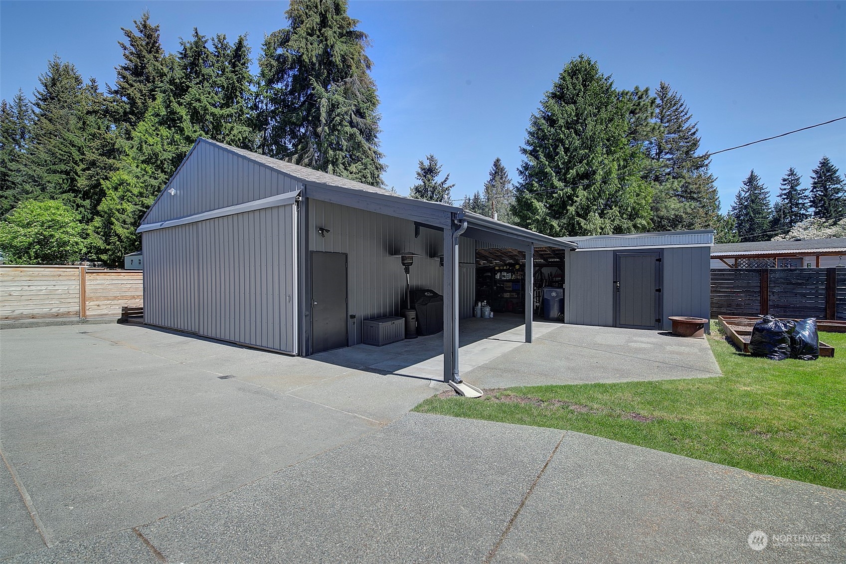 11717 2nd Drive Southeast, Unit A & B Everett, WA 98208 - Photo 36 of 40 a house view with a garden space and trees