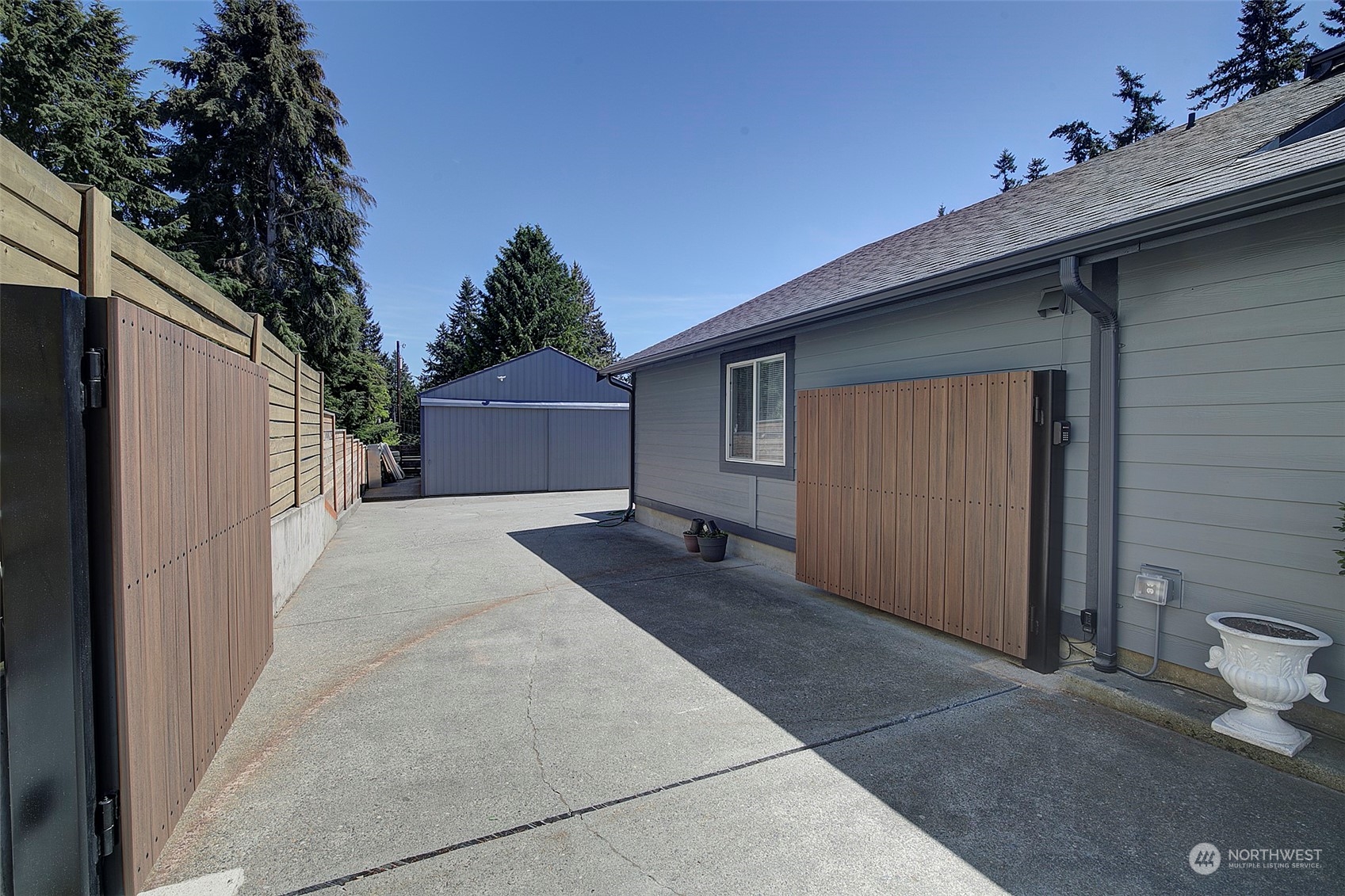 11717 2nd Drive Southeast, Unit A & B Everett, WA 98208 - Photo 38 of 40 a view of a house with a yard and garage