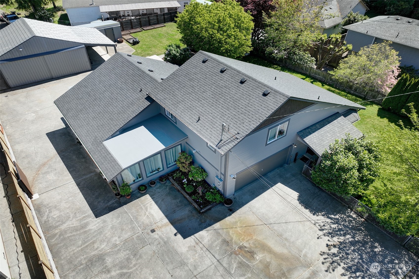 11717 2nd Drive Southeast, Unit A & B Everett, WA 98208 - Photo 40 of 40 an aerial view of a house with a yard and large tree