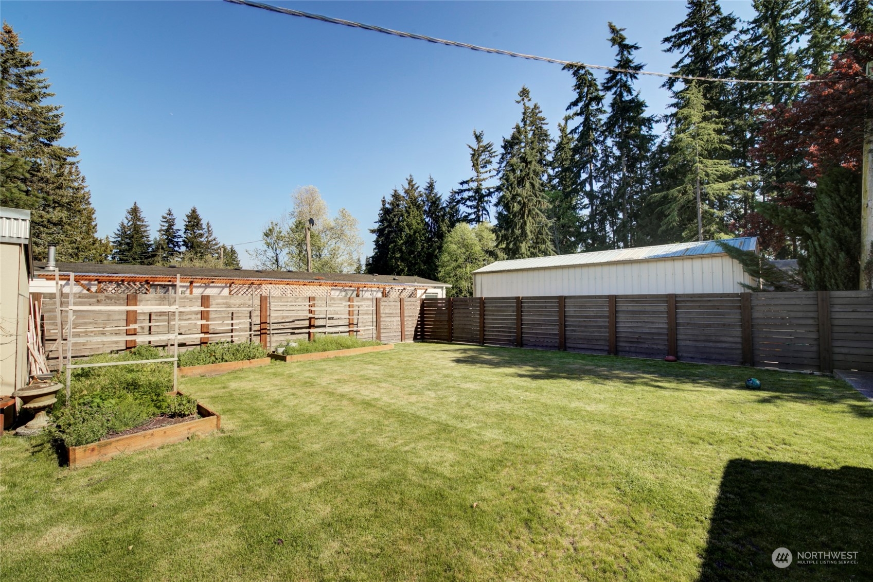 11717 2nd Drive Southeast, Unit A & B Everett, WA 98208 - Photo 4 of 40 a view of a house with a yard and sitting area
