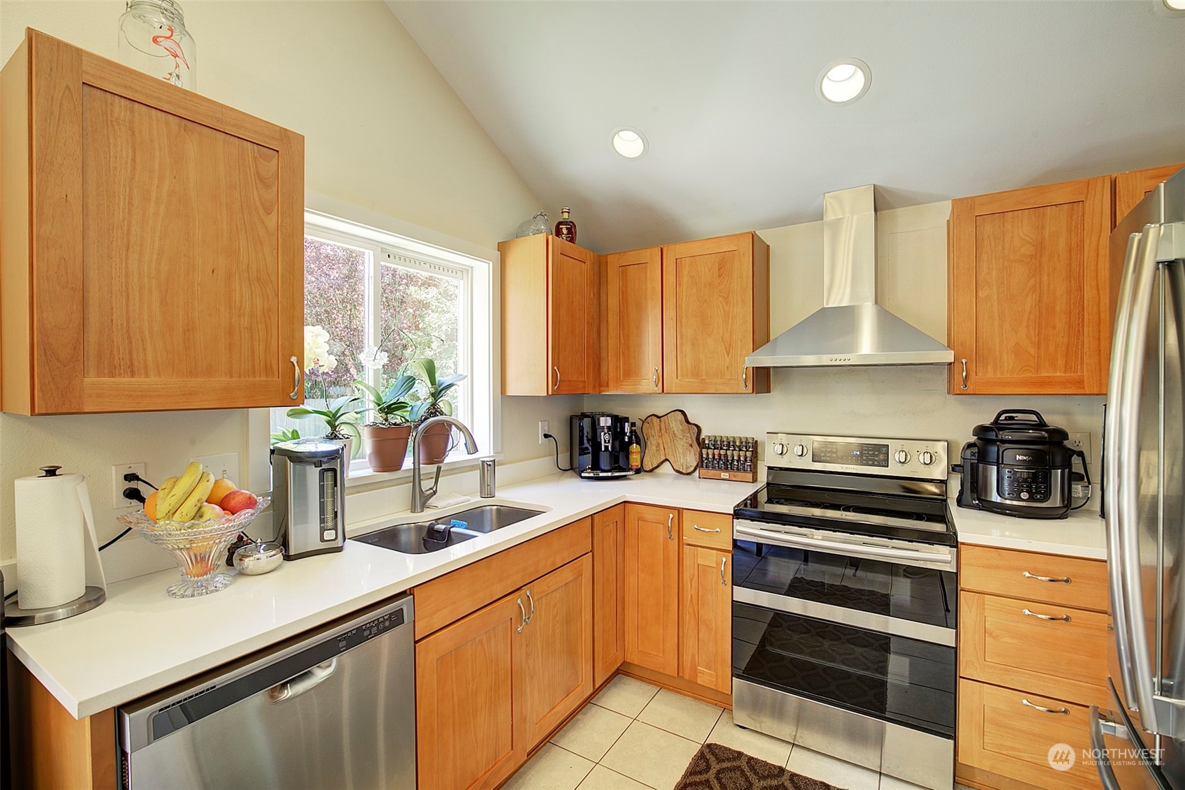 11717 2nd Drive Southeast, Unit A & B Everett, WA 98208 - Photo 5 of 40 a kitchen with a sink a stove and cabinets