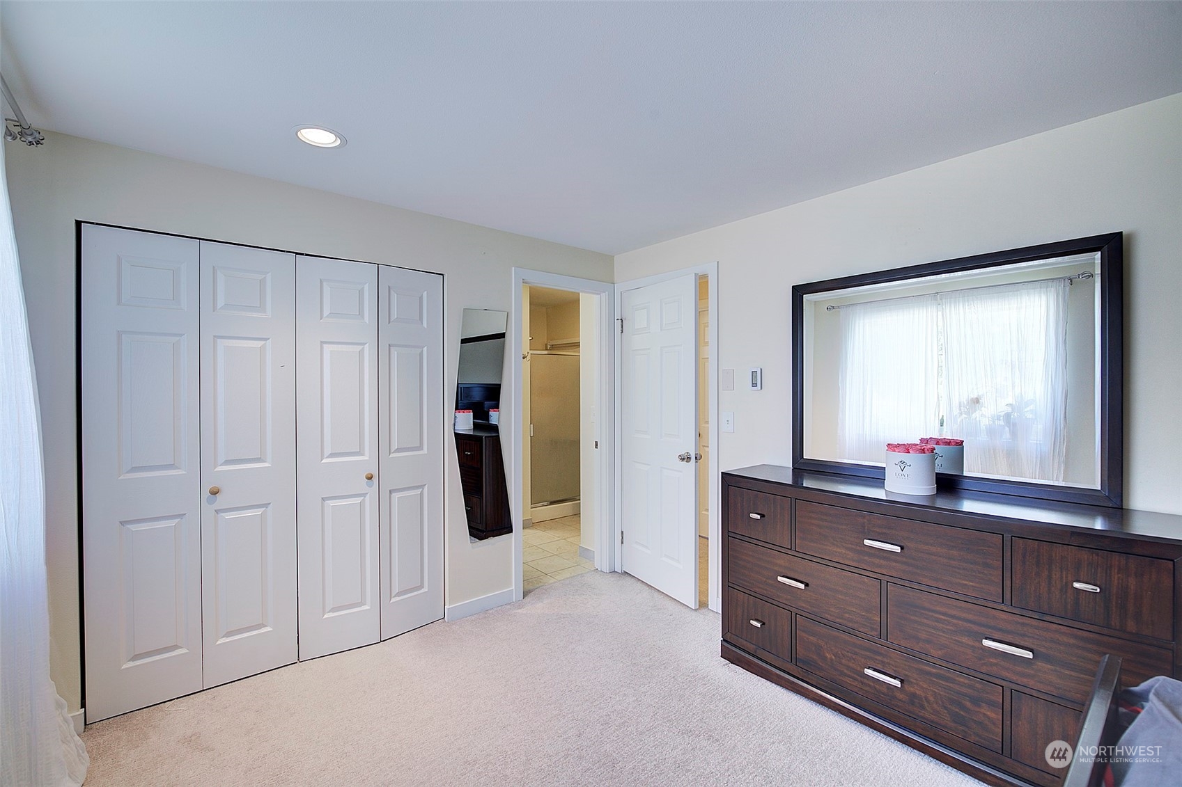 11717 2nd Drive Southeast, Unit A & B Everett, WA 98208 - Photo 10 of 40 a room with a dresser and a mirror