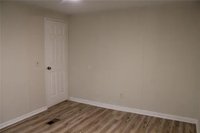 a bathroom with a sink toilet and window