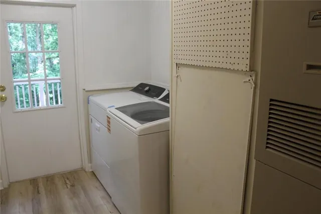 a view of deck with wooden floor and fence