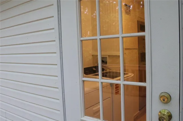 a view of a balcony with wooden floor