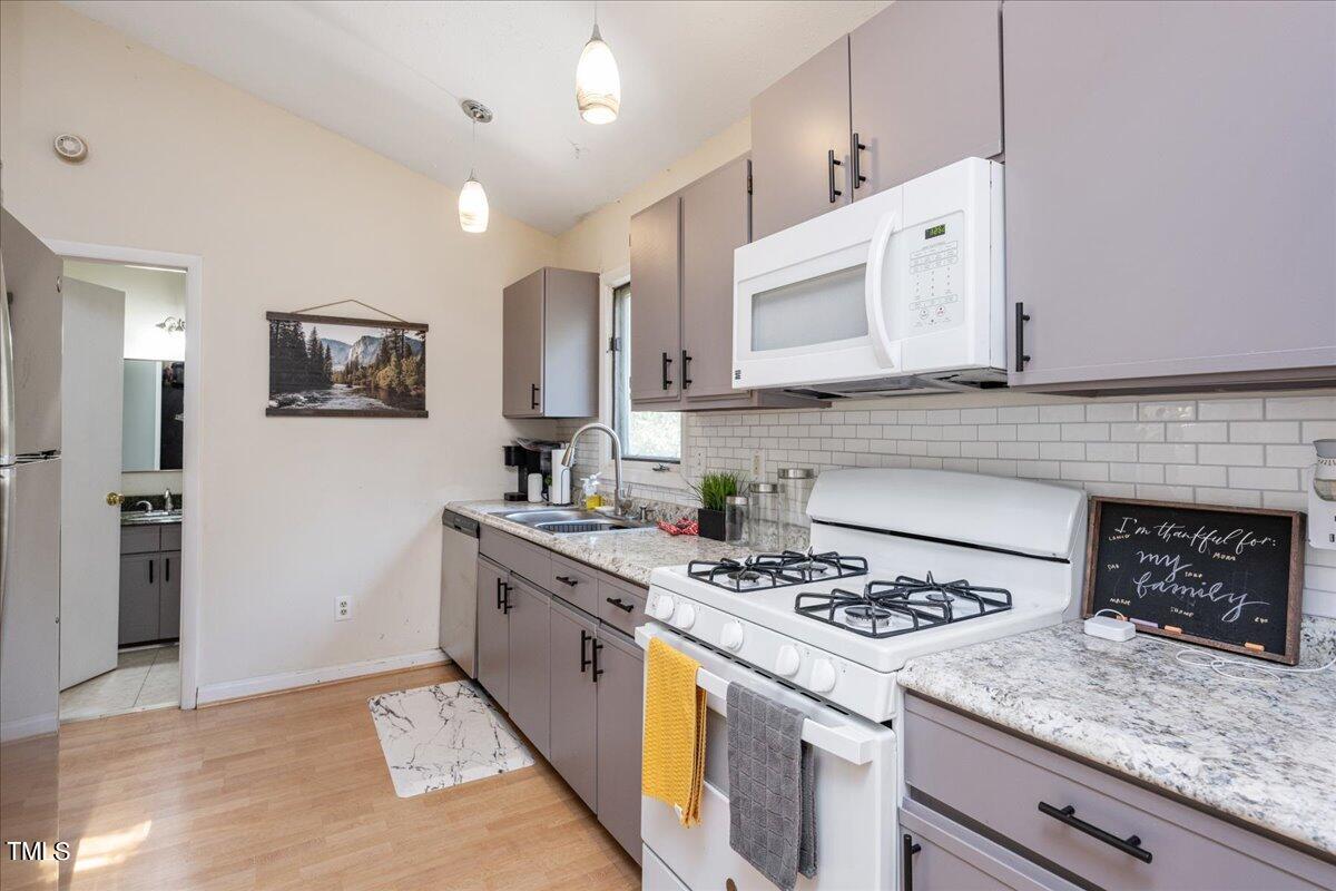 205 Spring Street Durham, NC 27703 - Photo 3 of 25 Upstairs kitchen + in-law suite 1