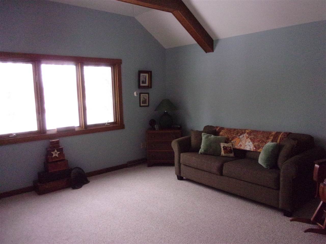 3745 Freeport Road Rockton, IL 61072 - Photo 12 of 24 a living room with furniture and a window