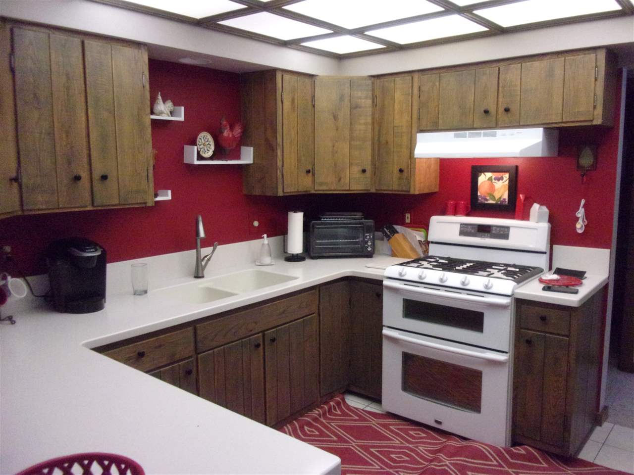 3745 Freeport Road Rockton, IL 61072 - Photo 16 of 24 a kitchen with a stove and a sink
